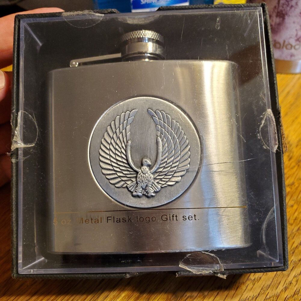 6 oz stainless steel hip flask with pewter eagle on front. Open box